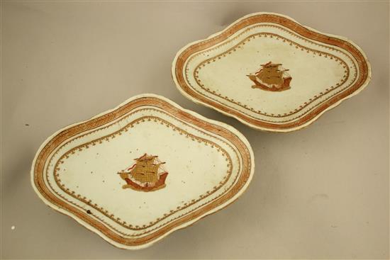 A pair of Chinese export enamelled porcelain lozenge shaped dishes, 19th century, made for the American market, 26.5cm